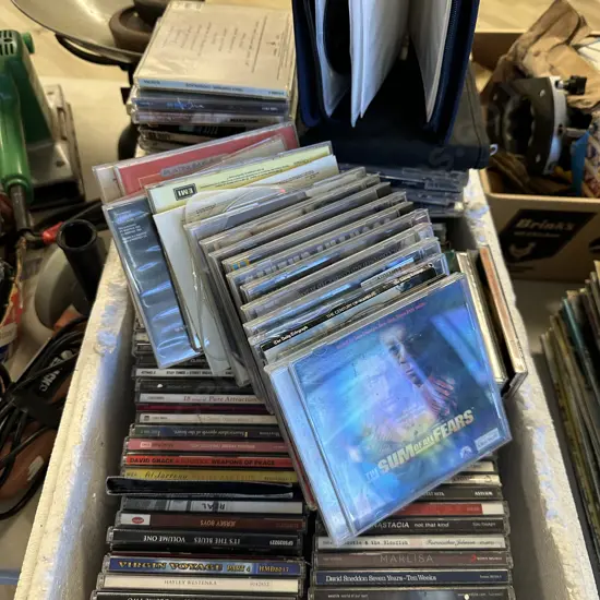White Bin Of Assorted Cds & Cases