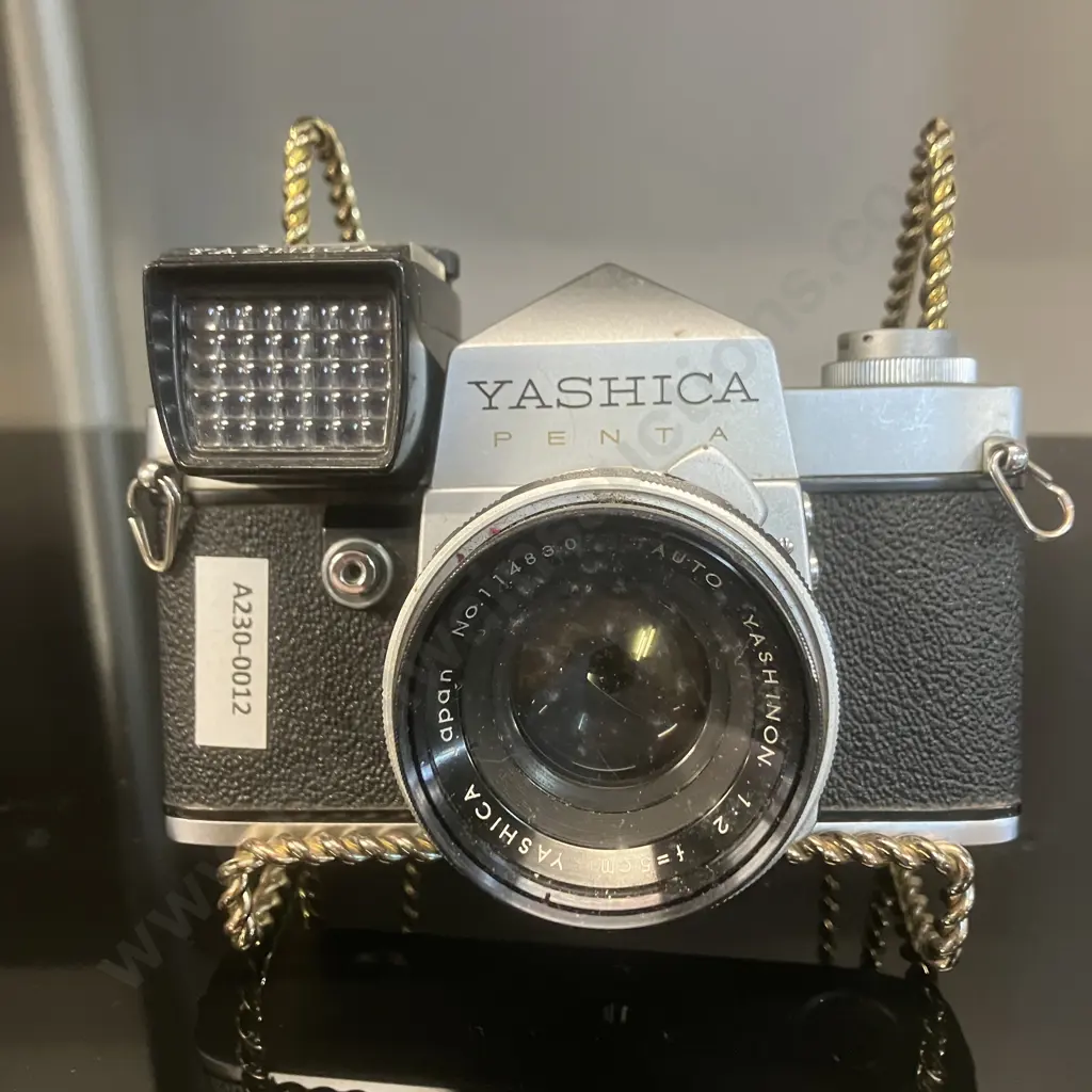 Yashica Penta J (#10109904)With Clip-on, Shutter-Coupled Exp Meter, Auto Yashinon 1:2 f5cm Lens (#114830) - 1961 Japan Image 1++