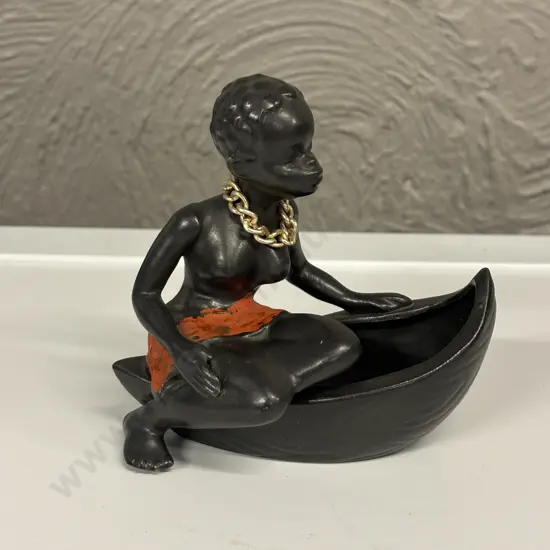 Mid Century African Lady seated on boat shaped dish