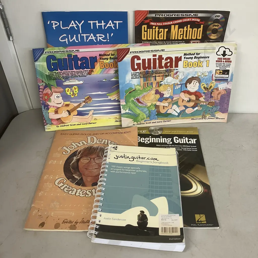 Guitar Lessons & Song Books Image 1++