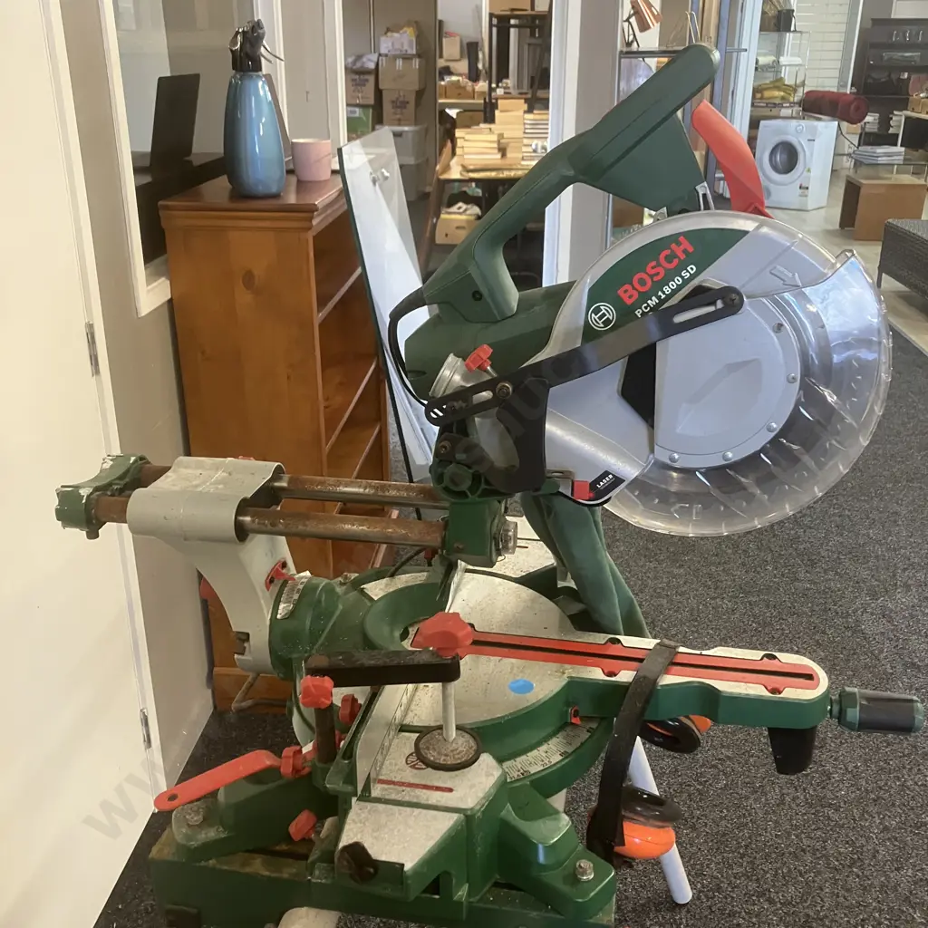 Bosch Sliding Compound Mitre Saw PCM1800 SD - 1800 Watt, 254mm With Bosch Mitre Saw Stand PTA 1 Image 1++
