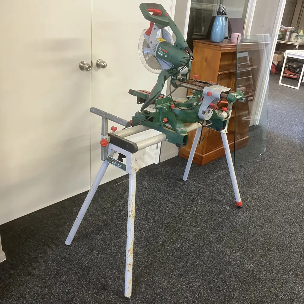 Bosch Sliding Compound Mitre Saw PCM1800 SD - 1800 Watt, 254mm With Bosch Mitre Saw Stand PTA 1 Image 1++