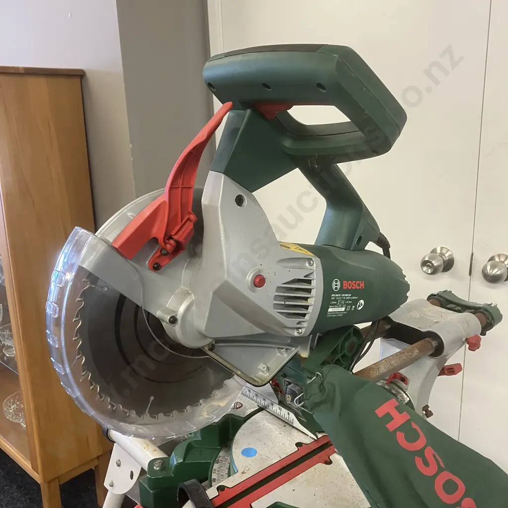 Bosch Sliding Compound Mitre Saw PCM1800 SD - 1800 Watt, 254mm With Bosch Mitre Saw Stand PTA 1 Image 1++