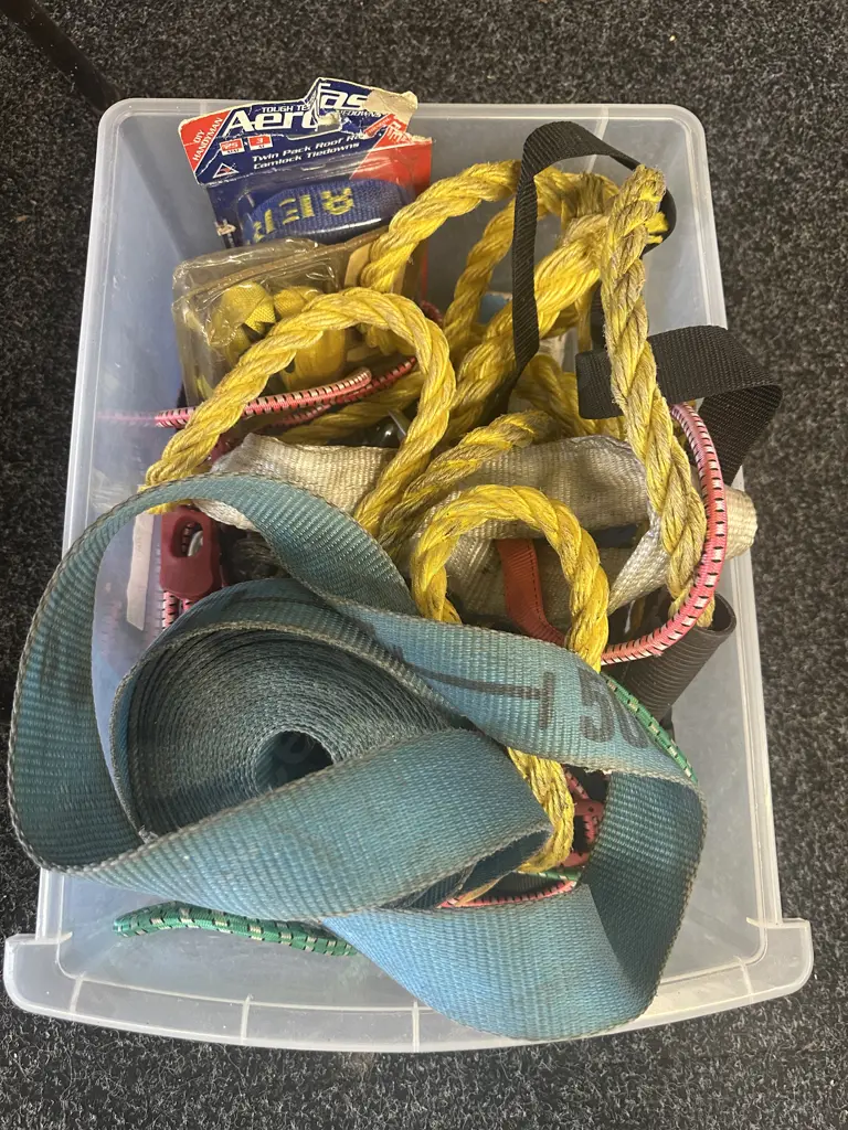 Clear Bin Of Tie Downs & Bungee Cords Etc Image 1++