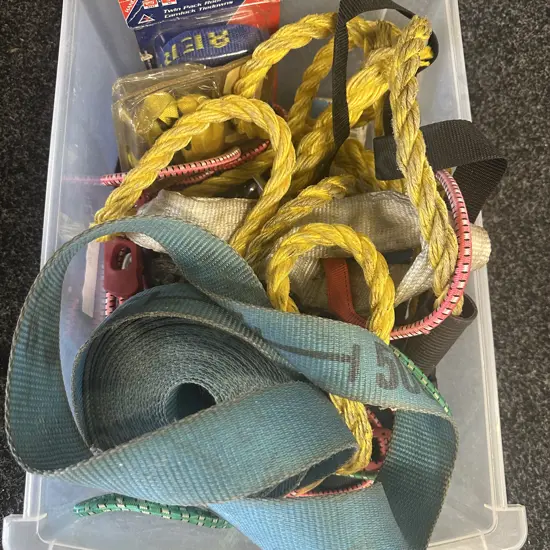 Clear Bin Of Tie Downs & Bungee Cords Etc