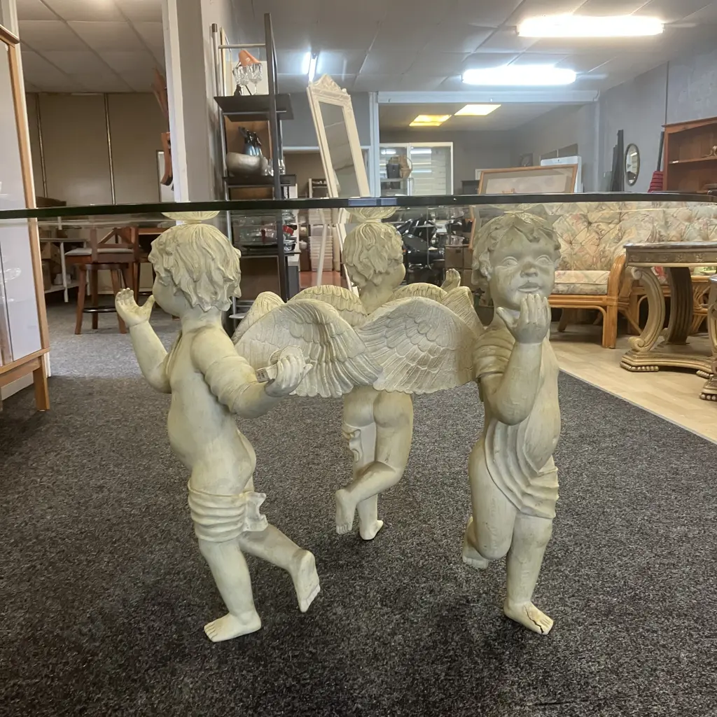 Cherub Trio Vintage Coffee Table With Round Glass Top. 76 x 137cm (As Found) Image 1++