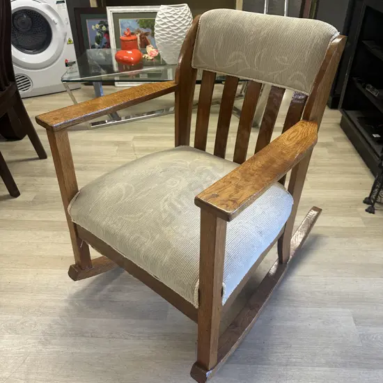 Art Nouveau Oak Rocking Chair Slat Back Cream Upholstery H85,W66,D85cm.