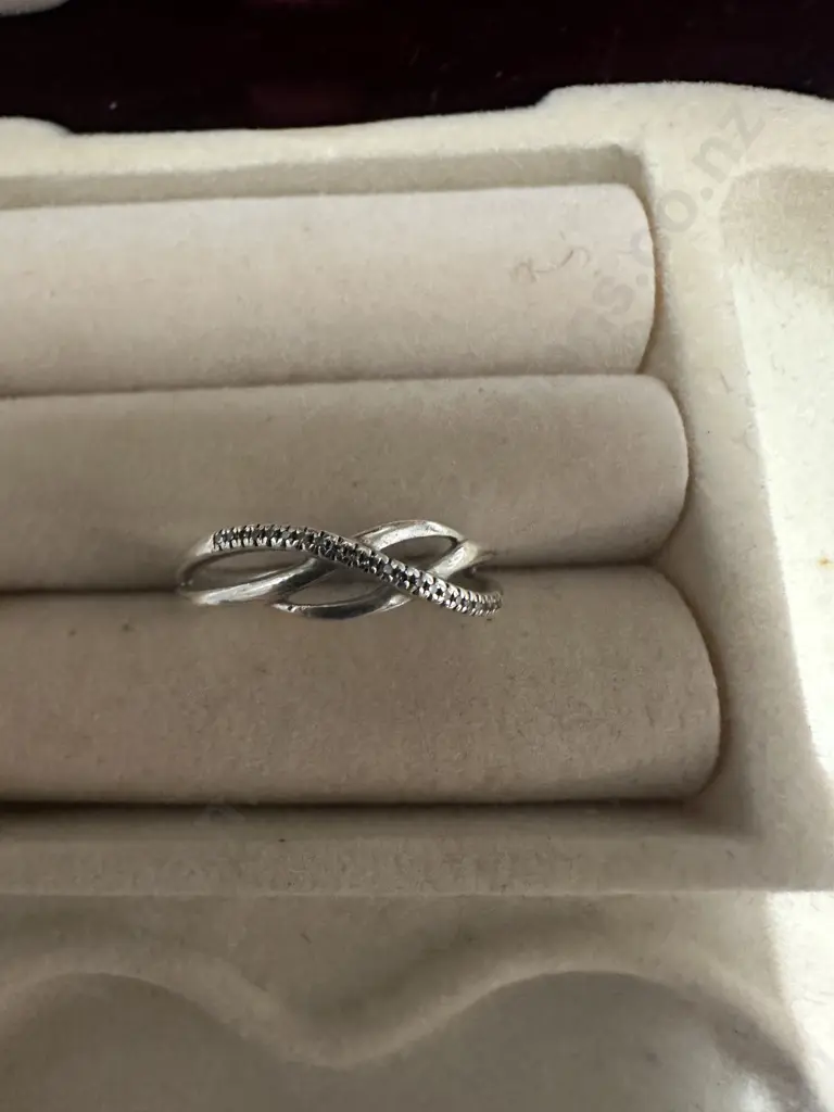 Silver Ring  Stamped 0.04 TDW With Small Diamonds In Wave Shape Image 1++