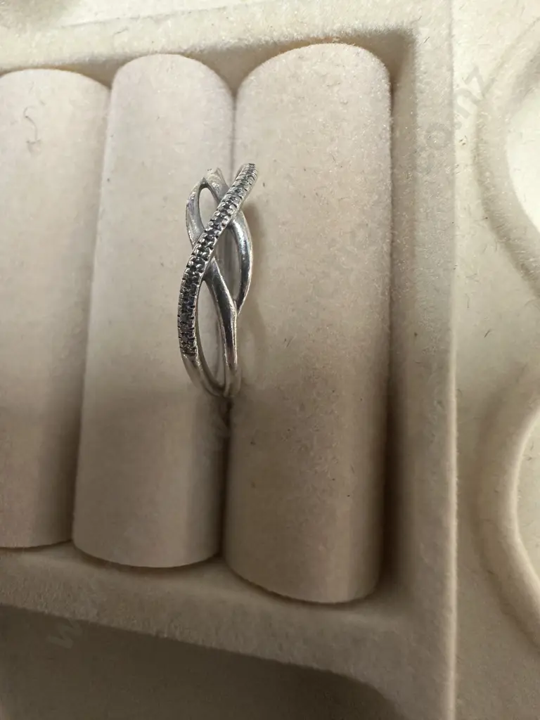 Silver Ring  Stamped 0.04 TDW With Small Diamonds In Wave Shape Image 1++