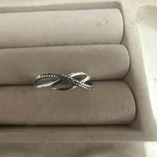 Silver Ring  Stamped 0.04 TDW With Small Diamonds In Wave Shape