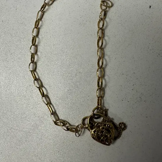 Stamped 375 Gold Bracelet With Heart Clasp (Broken)
