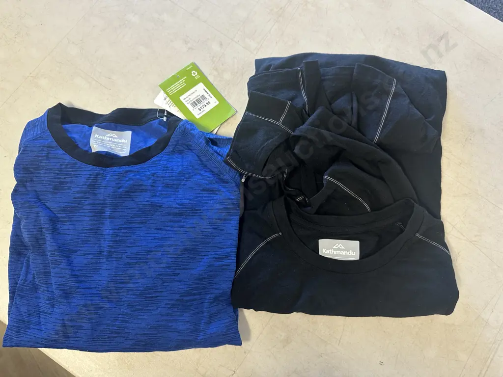 Kathmandu Merino Pro X2 Size XL Surf Blue & Black Colours Image 1++