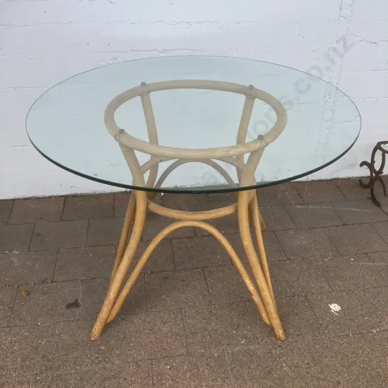 Round Glass Top Cane Table. 69 x 99cm
