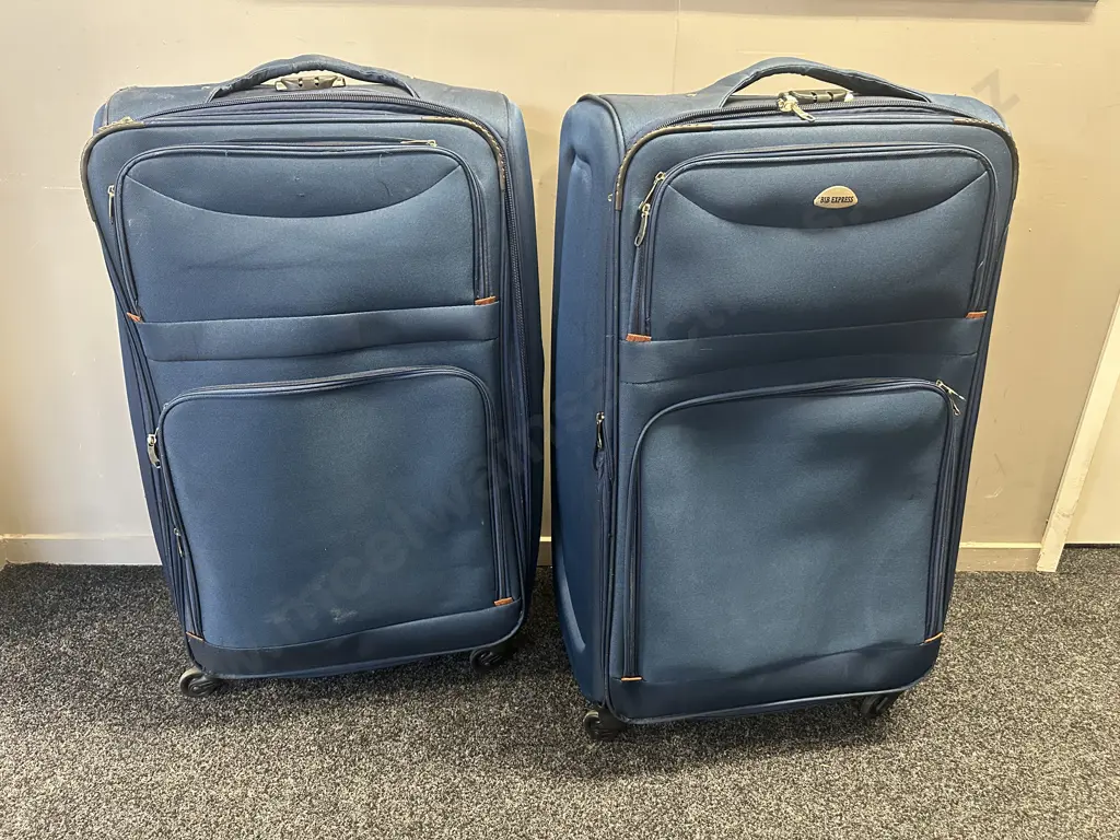 Pair Of Blue BIB Express Suitcases H88,W52cm. Image 1++