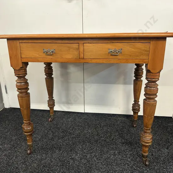 Kauri 2 Drawer Writing Table, Turned Legs, Bakelite Castors. H75 W93 D52cm