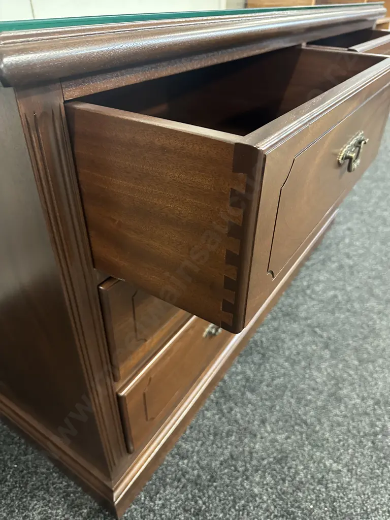 Solid Mahogany Four Drawer Lowboy With Glass Top & Ornate Metal Handles H72,W120,D52cm. Image 1++