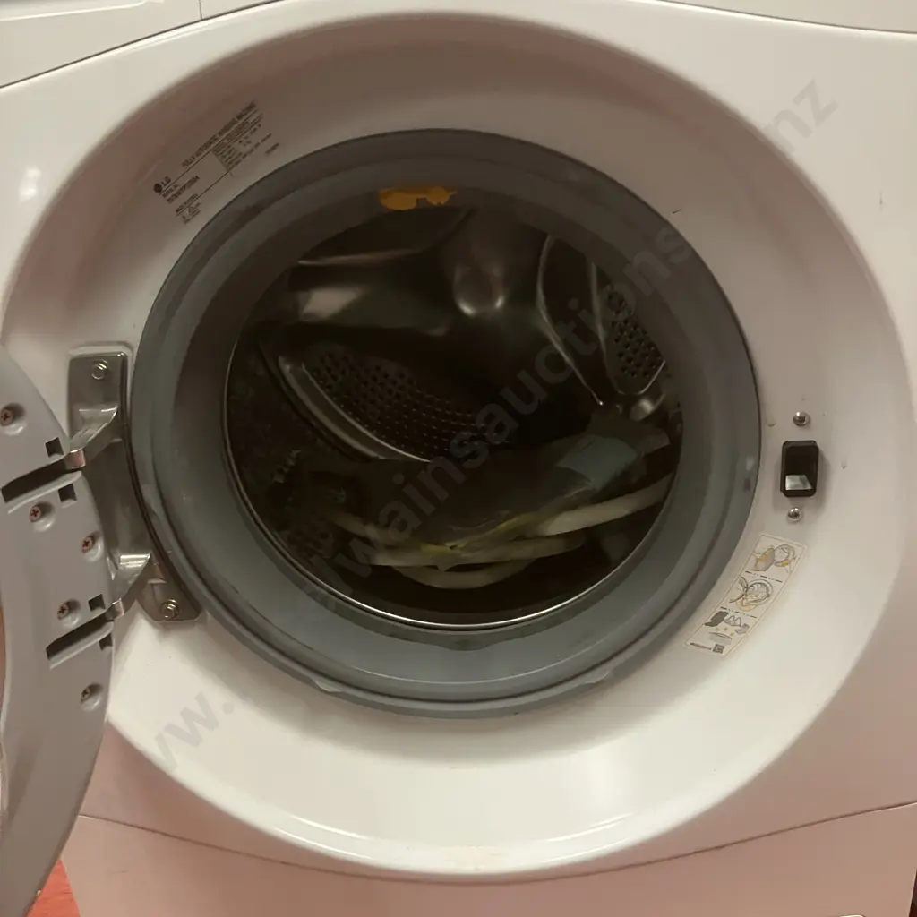 LG 8kg Front Loader Washing Machine WD1408NPW with TurboClean® & 6 Motion Direct Drive Image 1++