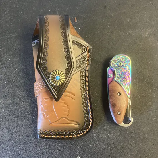 Folding Knife In Leather Scabbard