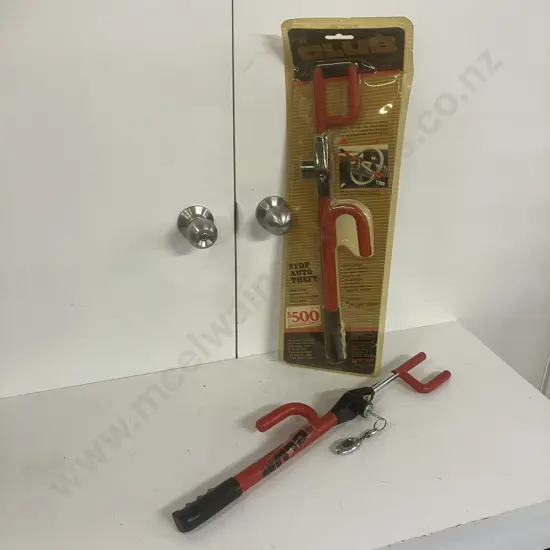 "The Club" Steering Wheel Lock Unused In Original Packaging With A Used "The Club" With Key & Keyring Light