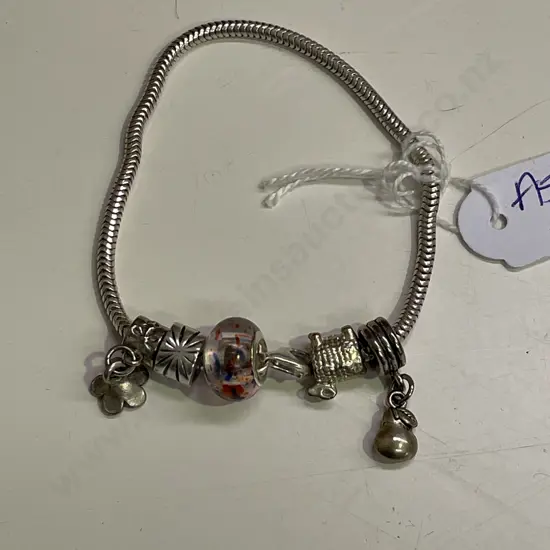 Sterling Silver Pandora style bracelet with assorted charms