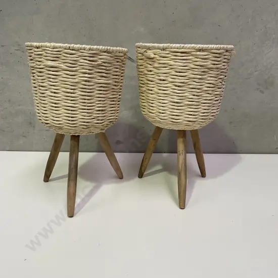 Pair Retro Syle tri-footed plant stands. Wooden legs with Basket weave top. H43cm