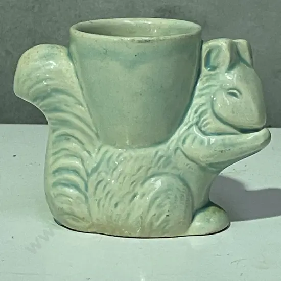 Crown Lynn? Squirrel Egg Cup. Mottled cream and teal colourway