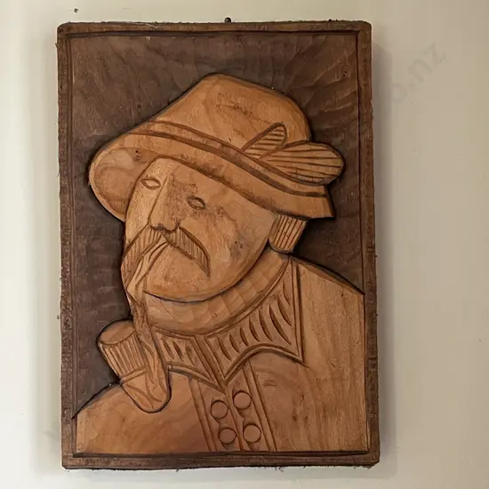 Carved Wooden Panel with man smoking pipe