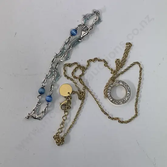 Unmarked gold chain pendant with daimante pendant and sterling silver bracelet